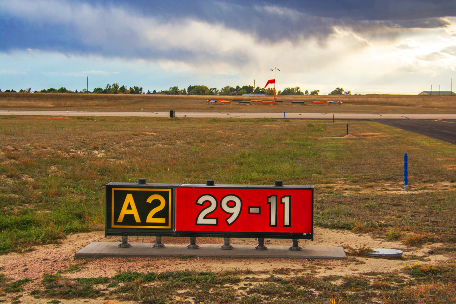 AKO runway/taxiway sign